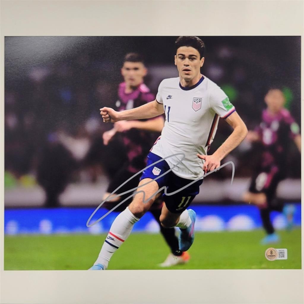 Giovanni Gio Reyna Signed USA Soccer 11x14 Photo Beckett BAS: Giovanni Gio Reyna Signed USA Soccer 11x14 Photo Beckett BAS This is an authentic signed 11x14 photo of Giovanni Gio Reyna representing the US Men's National Team (USMNT). The photograph is certified 