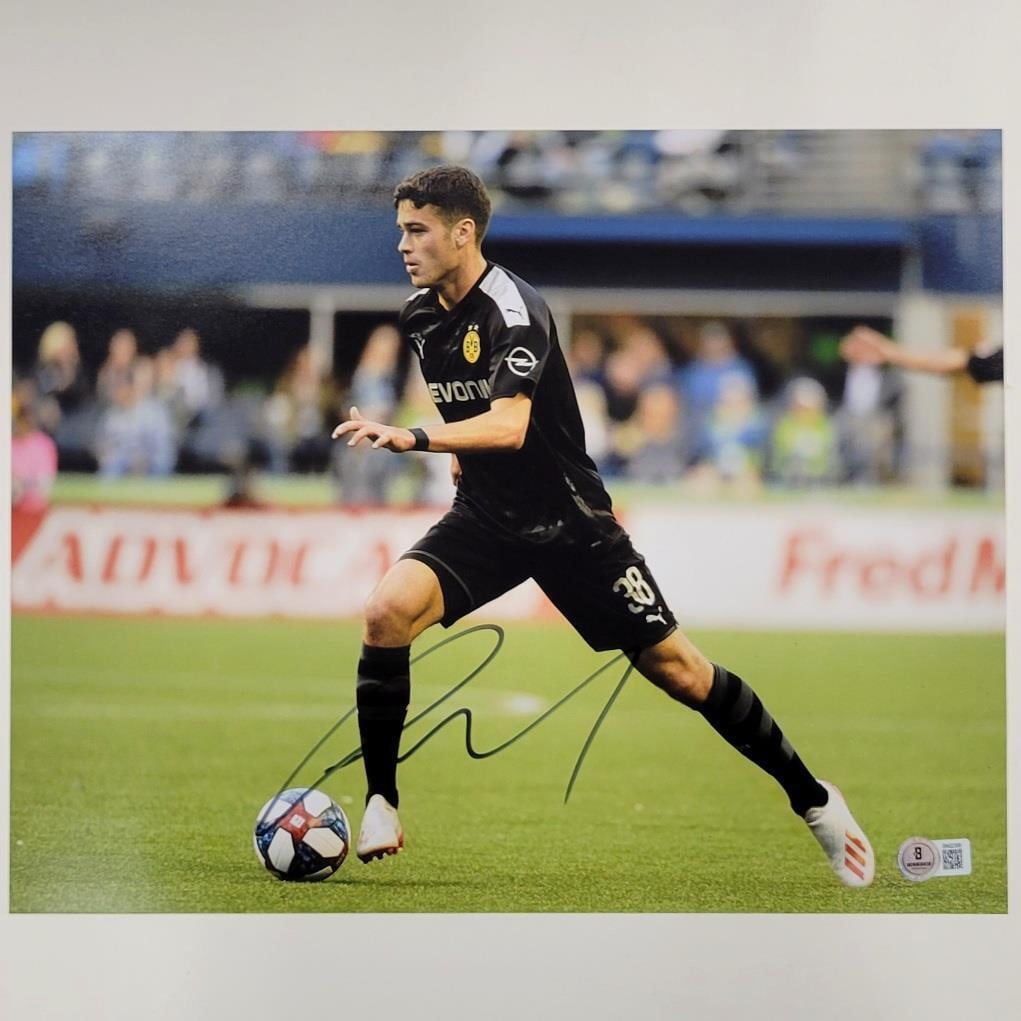 Gio Reyna Signed Borussia Dortmund 11x14 Photo Beckett Authenticated: Gio Reyna Signed Borussia Dortmund 11x14 Photo Beckett Authenticated Capture a piece of soccer history with this Giovanni Gio Reyna signed 11x14 photo from Borussia Dortmund. This original photograph 