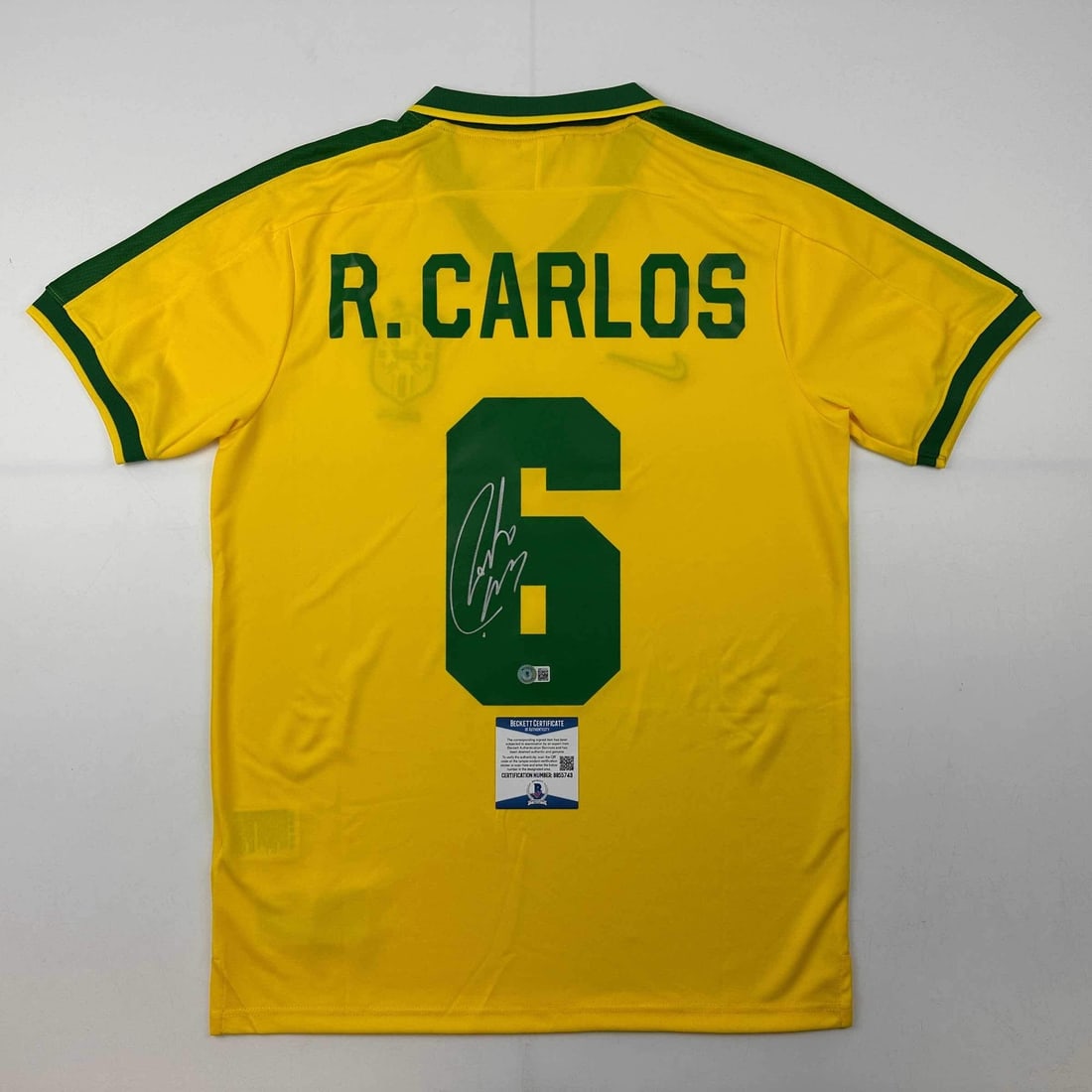 Roberto Carlos Brazil Retro Soccer Jersey Signed Beckett COA: Roberto Carlos Brazil Retro Soccer Jersey Signed Beckett COA Celebrate the legacy of Roberto Carlos with this autographed Brazil Yellow Retro Soccer Jersey. This collectible item features a bold displ