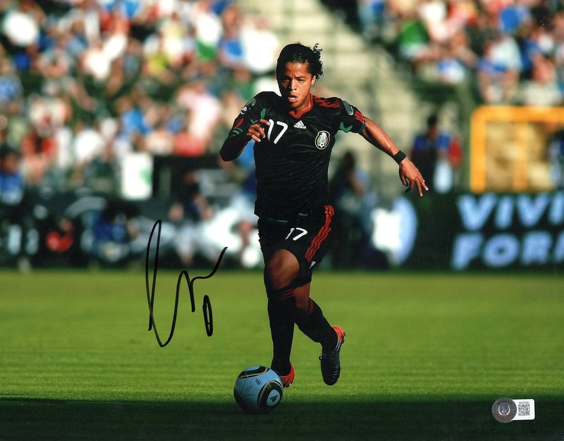 Giovani dos Santos Signed 11x14 Barcelona Photo Beckett Authenticated: Giovani dos Santos Signed 11x14 Barcelona Photo Beckett Authenticated This is an authentic 11x14 photo of Giovani dos Santos in action while playing for Barcelona. The photo is professionally authenti