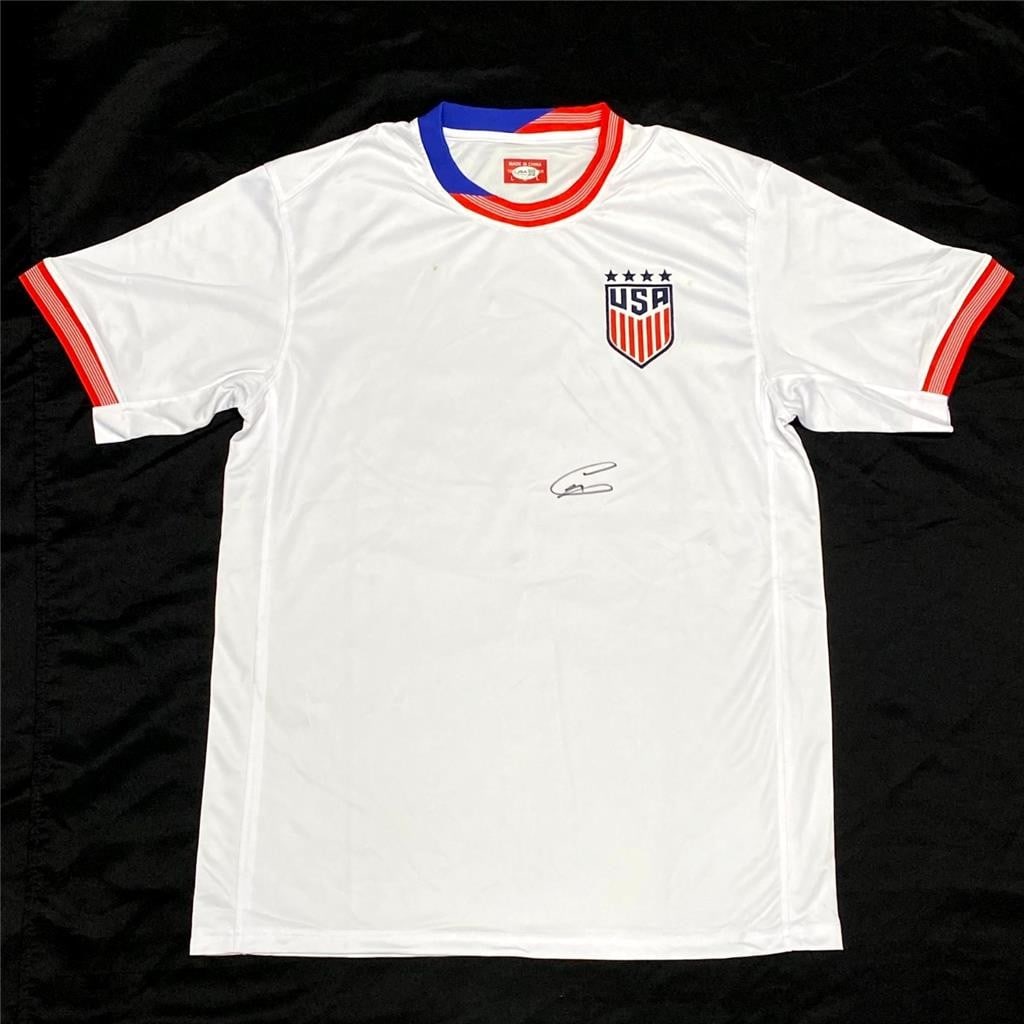 JSA Certified Christian Pulisic Signed Team USA Soccer Jersey: JSA Certified Christian Pulisic Signed Team USA Soccer Jersey This pre-owned USMNT Team USA soccer jersey features the authentic autograph of Christian Pulisic. The signature has been verified by Jame