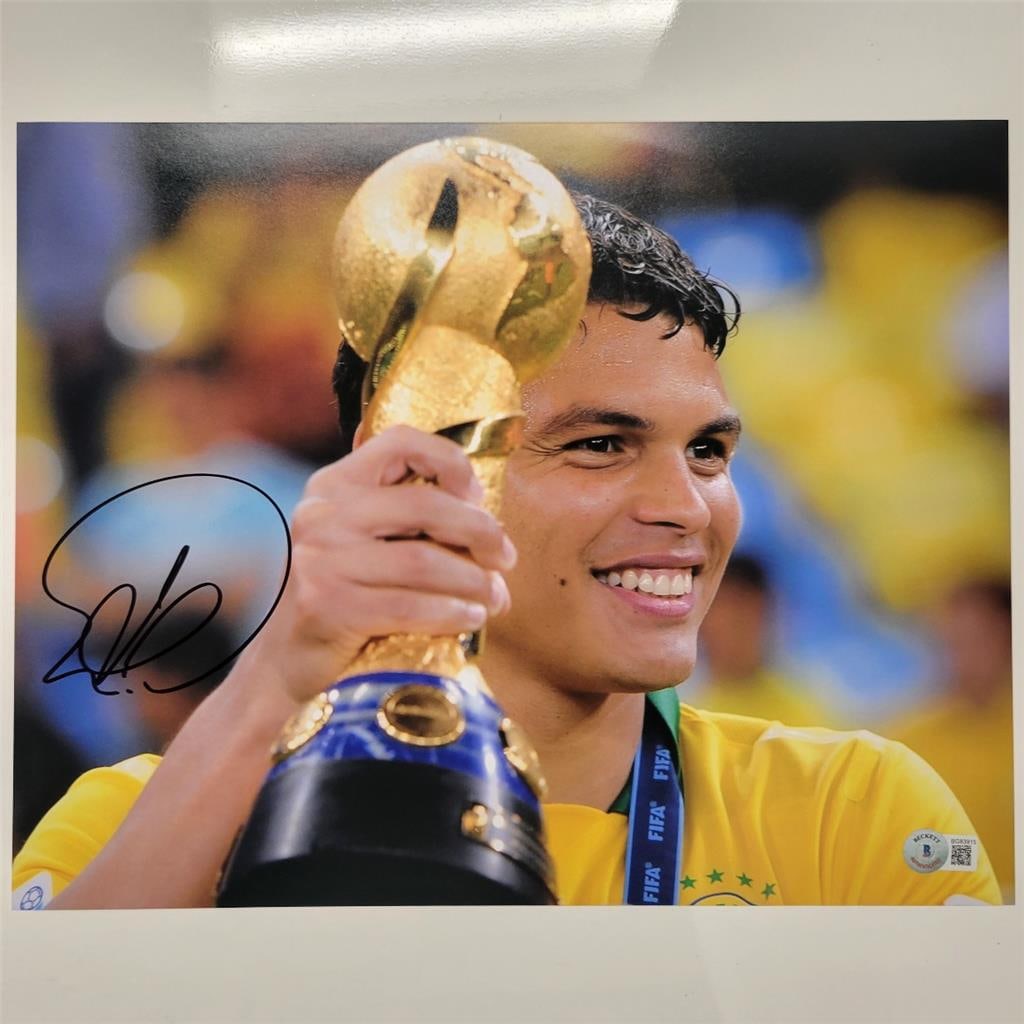 Thiago Silva Signed Brazil 11x14 Photo Beckett BAS Certified: Thiago Silva Signed Brazil 11x14 Photo Beckett BAS Certified This is an authentic signed 11x14 photo of soccer star Thiago Silva, showcasing his iconic moment with the Brazil national team. The autogr