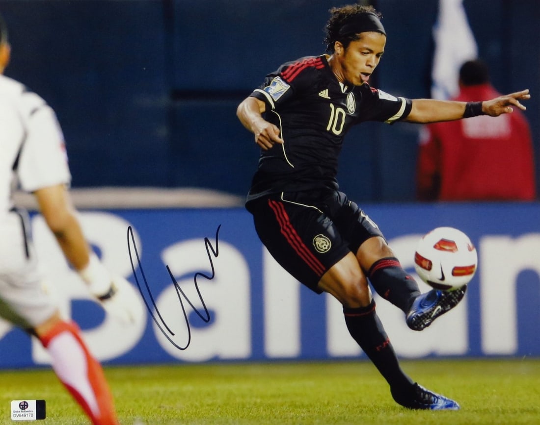 Giovani dos Santos GAI authenticated 11x14 signed soccer photo: Giovani dos Santos GAI authenticated 11x14 signed soccer photo This is an original 11x14 photo of Giovani dos Santos, signed by the player. The autograph has been authenticated by Global Authentics (G