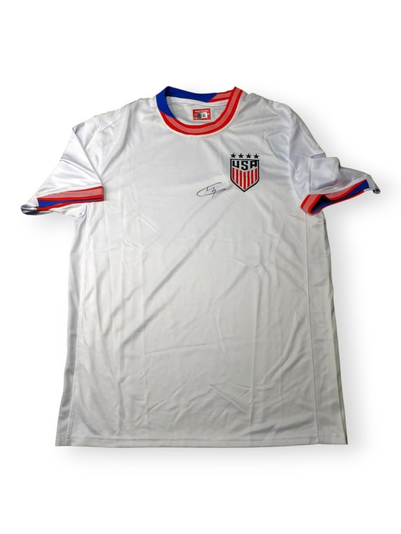 Christian Pulisic Autographed Team USA Jersey Signed Beckett Authenticated: Christian Pulisic Autographed Team USA Jersey Signed Beckett Authenticated This is an authentic Team USA jersey signed by soccer star Christian Pulisic. It features his official autograph and comes wi