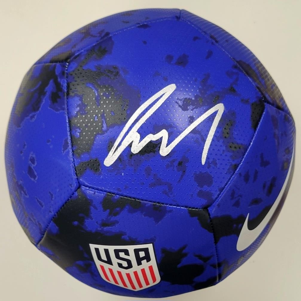 Gio Reyna Signed Team USA Soccer Ball with JSA Authentication: Gio Reyna Signed Team USA Soccer Ball with JSA Authentication This authentic signed soccer ball features the signature of Gio Reyna, a talented player from Team USA and Borussia Dortmund. The ball is 