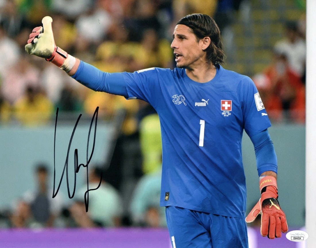 Yann Sommer Signed 11X14 Photo Inter Milan JSA Authenticated: Yann Sommer Signed 11X14 Photo Inter Milan JSA Authenticated This is an authentic 11X14 photograph of Yann Sommer, a prominent soccer player from Inter Milan, captured in a thumbs-up pose. The photo i