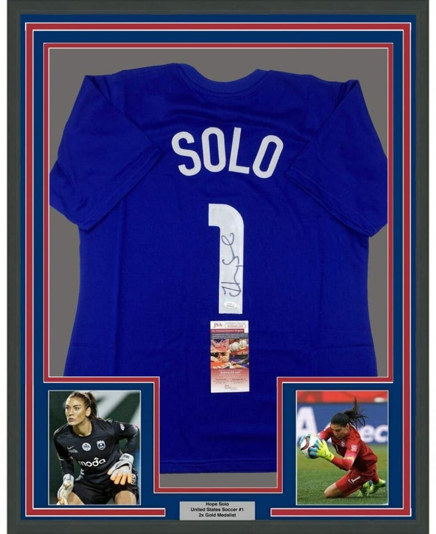 Framed Hope Solo Autographed USA Blue Soccer Jersey JSA COA 35x39: Framed Hope Solo Autographed USA Blue Soccer Jersey JSA COA 35x39 Showcase your passion for soccer with this professionally framed, autographed Hope Solo USA blue soccer jersey. Measuring 35 inches by