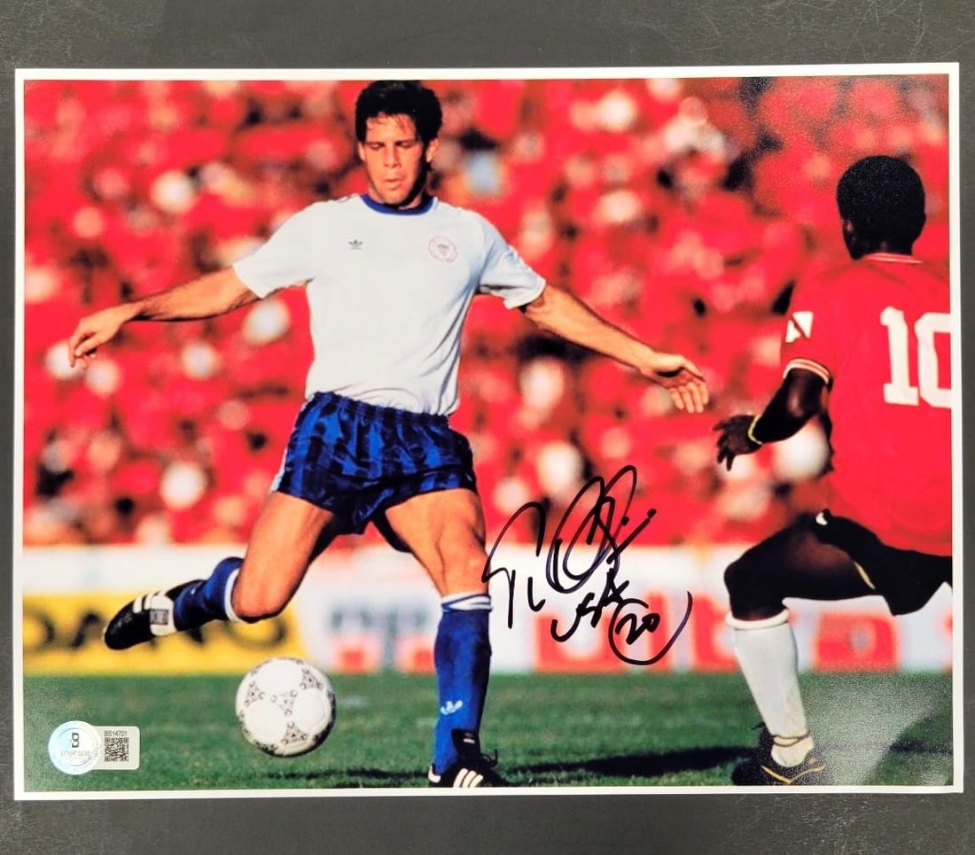 Paul Caligiuri Autographed USA 8.5x11 Photo 1990 World Cup Beckett BAS: Paul Caligiuri Autographed USA 8.5x11 Photo 1990 World Cup Beckett BAS This is an original signed photo of Paul Caligiuri from the 1990 World Cup, featuring authentic autographs verified by Beckett Au