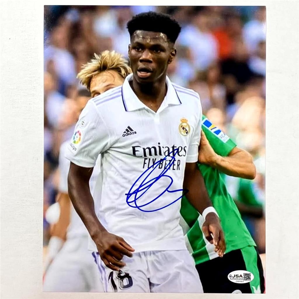 Aurelien Tchouameni autographed France soccer photo with Beckett authentication: Aurelien Tchouameni autographed France soccer photo with Beckett authentication This is an original 8.5x11 photo signed by Aurelien Tchouameni, featuring him as a player for Real Madrid and the France