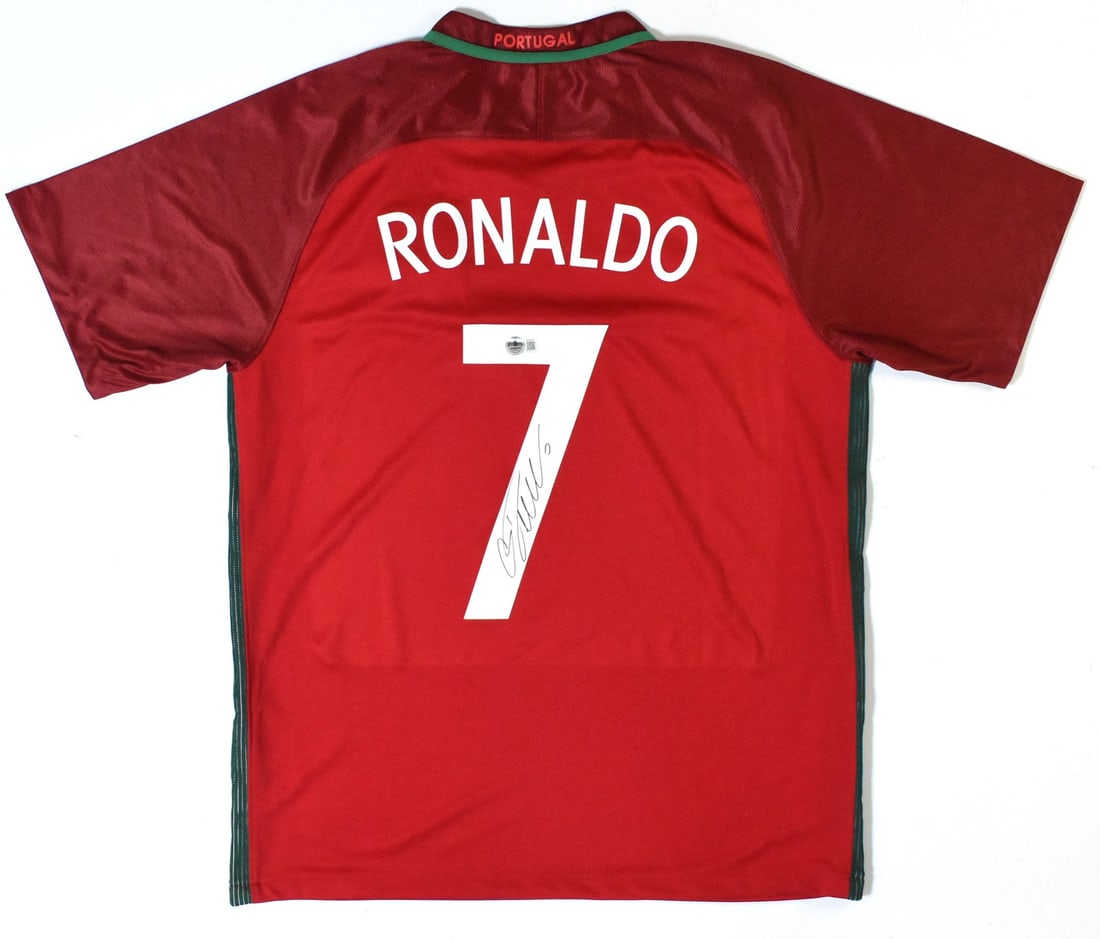 Portugal Home Jersey Signed by Cristiano Ronaldo with Beckett Hologram LOA: Portugal Home Jersey Signed by Cristiano Ronaldo with Beckett Hologram LOA This Portugal home soccer jersey features the number 7 and has been autographed by Cristiano Ronaldo. It is an original, pre-
