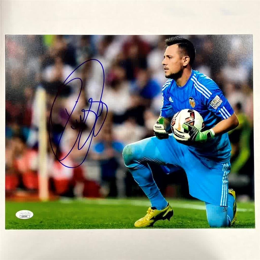 Autographed 11x14 Soccer Photograph Diego Alves Brazil JSA Authenticated: Autographed 11x14 Soccer Photograph Diego Alves Brazil JSA Authenticated This is an original 11x14 photo signed by Diego Alves, the Brazilian soccer player. The autograph is authenticated by James Spe