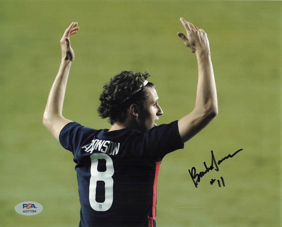 Brenden Aaronson Signed 8x10 Photo PSA/DNA Team USA Autographed Collectible: Brenden Aaronson Signed 8x10 Photo PSA/DNA Team USA Autographed Collectible This is a signed 8x10 photo of Brenden Aaronson, a notable player for Team USA. The autograph has been authenticated by PSA/