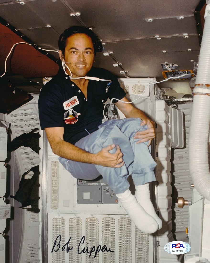 Robert Crippen Signed 8x10 NASA Astronaut Photo Authenticated by PSA DNA: Robert Crippen Signed 8x10 NASA Astronaut Photo Authenticated by PSA DNA This 8x10 photo features the signature of NASA astronaut Robert "Bob" Crippen, commemorating his involvement with the STS-42 mi