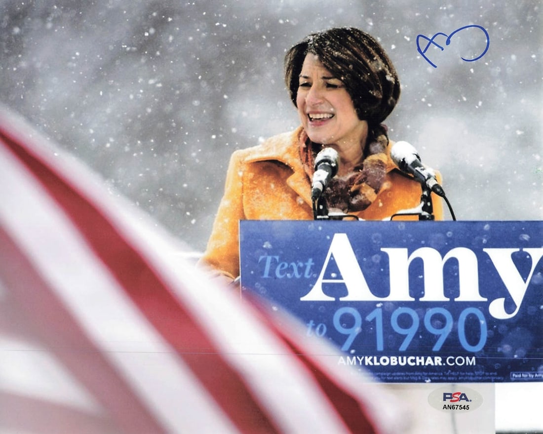 Amy Klobuchar Autographed 8x10 Photo PSA/DNA Certified: Amy Klobuchar Autographed 8x10 Photo PSA/DNA Certified This is a professionally printed 8x10 photograph featuring the signature of Amy Klobuchar, a notable politician. The autograph has been authentic