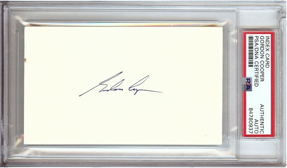 Gordon Cooper Signed Index Card NASA Mercury PSA/DNA Authenticated: Gordon Cooper Signed Index Card NASA Mercury PSA/DNA Authenticated This is an original autographed index card signed by Gordon Cooper, a notable astronaut from the NASA Mercury program. The index card
