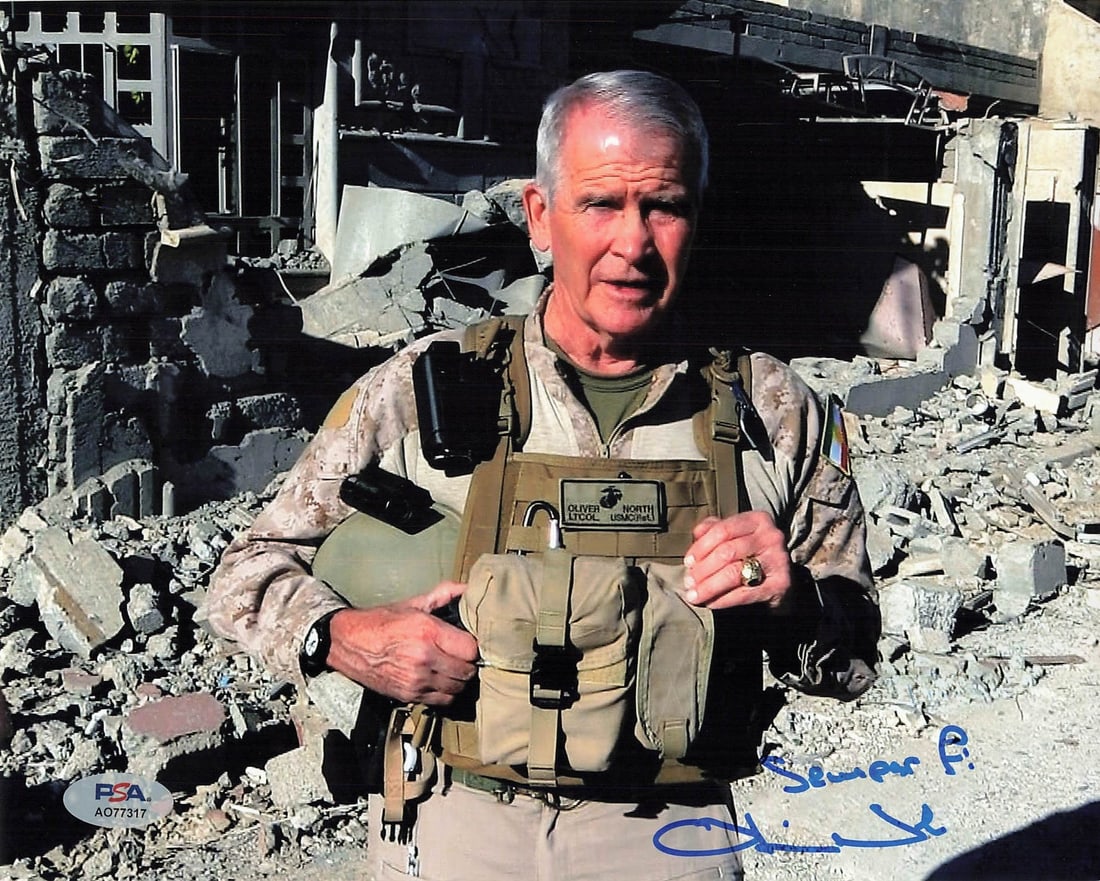 Oliver North Autographed 8x10 Photo PSA/DNA Certified: Oliver North Autographed 8x10 Photo PSA/DNA Certified This is a professionally printed 8x10 photograph signed by Oliver North, a notable author and political figure. The autograph has been authenticat