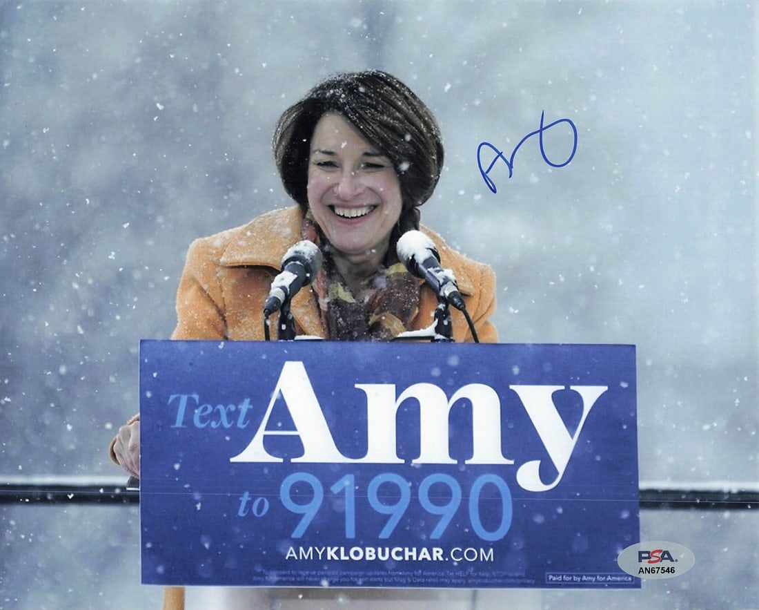 Amy Klobuchar Autographed 8x10 Photo PSA/DNA Certified: Amy Klobuchar Autographed 8x10 Photo PSA/DNA Certified This 8x10 photograph features the signature of politician Amy Klobuchar, offering a unique collectible for fans and collectors alike. The autogra