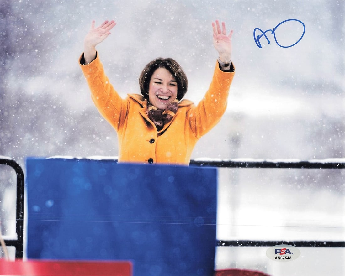 Amy Klobuchar 8x10 Photo Autographed PSA/DNA Certified: Amy Klobuchar 8x10 Photo Autographed PSA/DNA Certified This is a professionally printed 8x10 photograph featuring the signature of Amy Klobuchar, a prominent politician. The autograph has been verifie