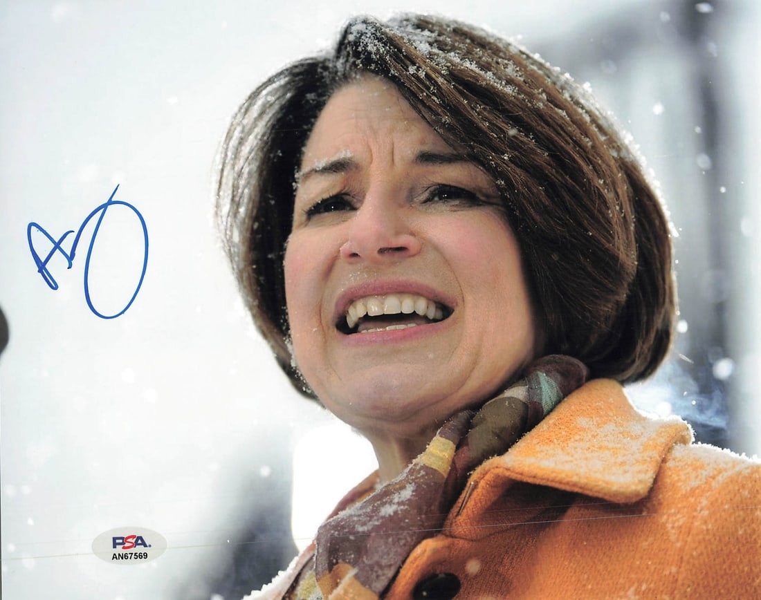 Amy Klobuchar Signed 8x10 Photo PSA/DNA Authentic Autograph: Amy Klobuchar Signed 8x10 Photo PSA/DNA Authentic Autograph This is an original 8x10 photograph signed by Amy Klobuchar, a prominent politician. The autograph has been authenticated by PSA/DNA, ensuri