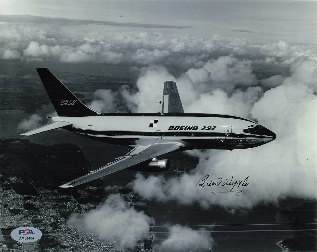 Brien Wygle Autographed 8x10 Photo PSA/DNA Authentic Signature: Brien Wygle Autographed 8x10 Photo PSA/DNA Authentic Signature This is an original 8x10 photograph signed by Brien Wygle, a notable pilot. The autograph has been authenticated by PSA/DNA, ensuring its