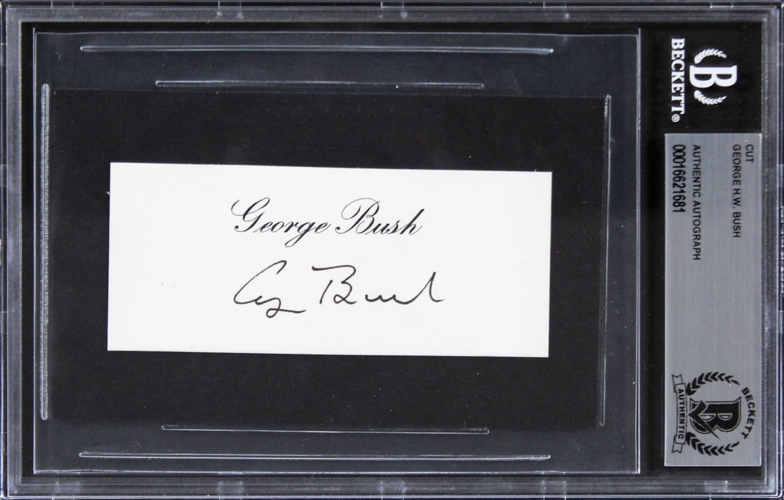Slabbed Cut Signature Signed by George H.W. Bush Beckett Authenticated 1.75x4: Slabbed Cut Signature Signed by George H.W. Bush Beckett Authenticated 1.75x4 This item features a 1.75 x 4 inch cut signature personally signed by George H.W. Bush. The autograph is authenticated and