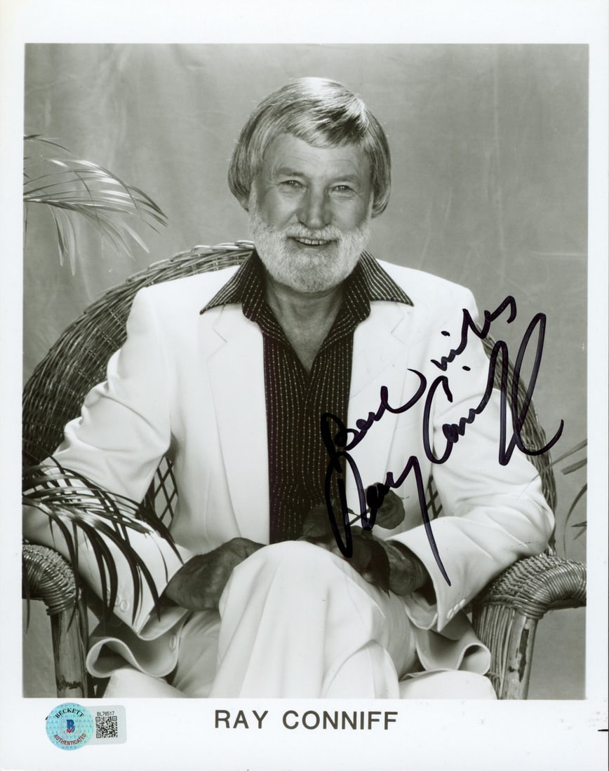Ray Conniff Signed 8x10 Black and White Photo Beckett Authenticated: Ray Conniff Signed 8x10 Black and White Photo Beckett Authenticated This authentic signed 8x10 black and white photograph features the renowned musician Ray Conniff. The photograph has been personally