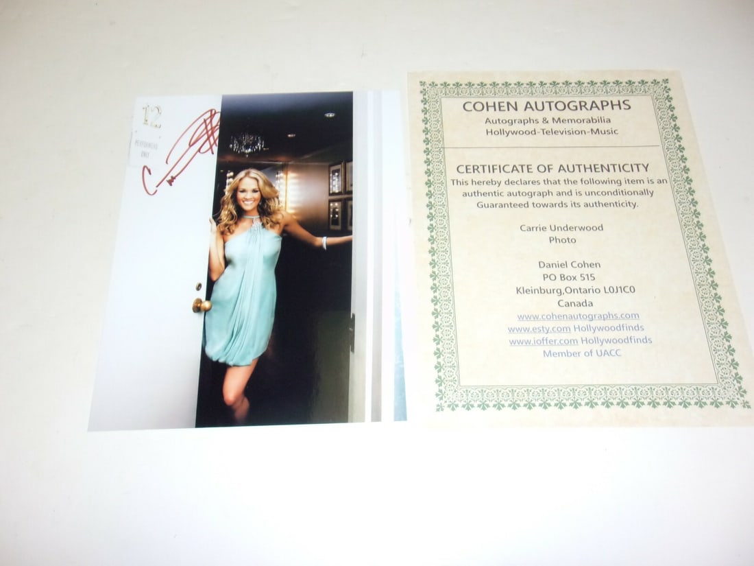 Carrie Underwood Signed 8x10 Photo with COA Country Music Legend: Carrie Underwood Signed 8x10 Photo with COA Country Music Legend This is an original 8x10 photograph signed by Carrie Underwood, renowned for her contributions to country music. The photograph comes w