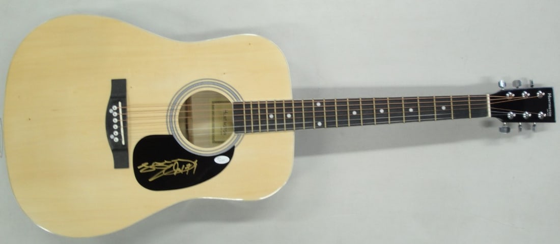 Guitar Signed by Tony Hadley of Spandau Ballet JSA Authenticated: Guitar Signed by Tony Hadley of Spandau Ballet JSA Authenticated This pre-owned guitar and guitar pick are hand signed by Tony Hadley of Spandau Ballet. The autograph is authenticated by James Spence 