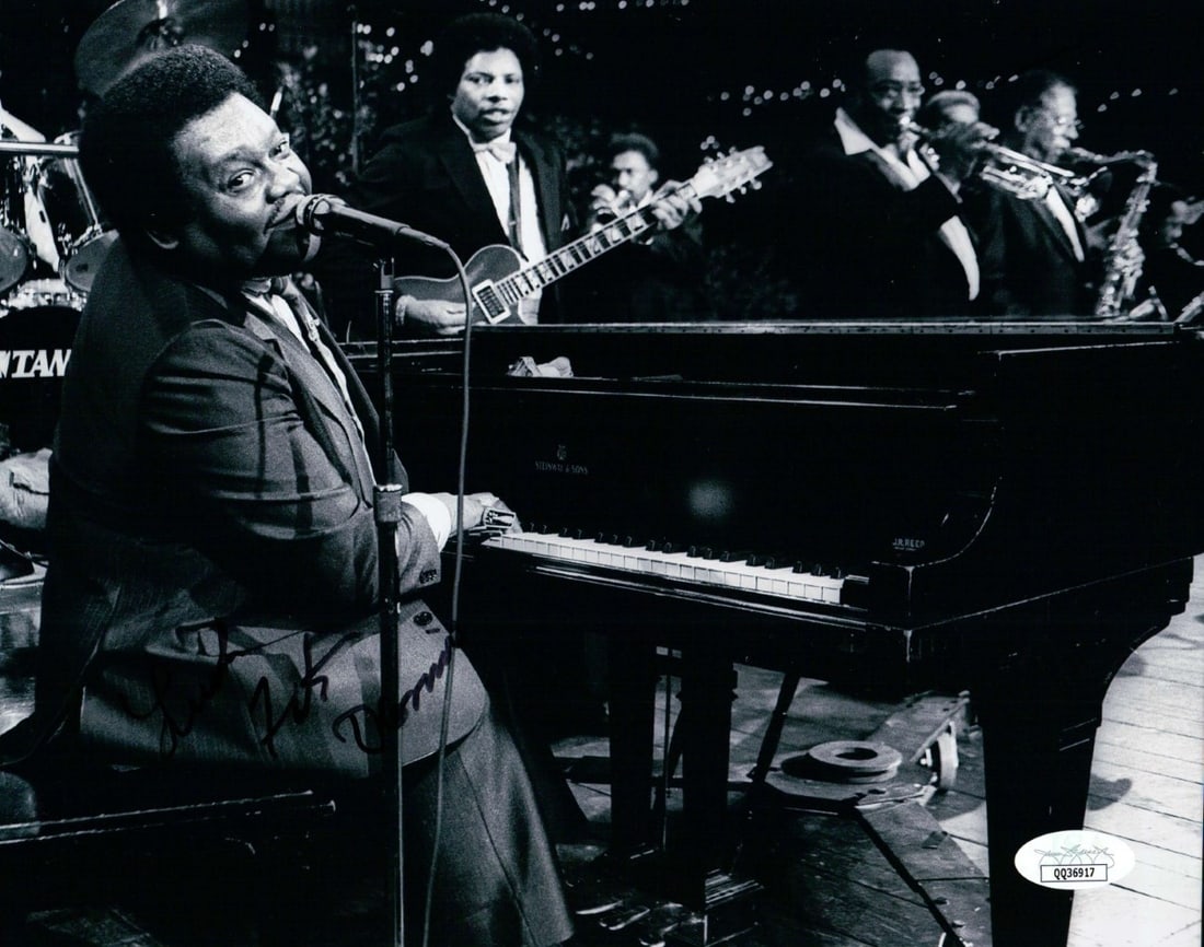 Fats Domino Autographed 8x10 Photo Playing Piano JSA Certified: Fats Domino Autographed 8x10 Photo Playing Piano JSA Certified This is an original 8x10 photo of Fats Domino, featuring the legendary musician playing the piano. The photo is autographed by Fats Domin