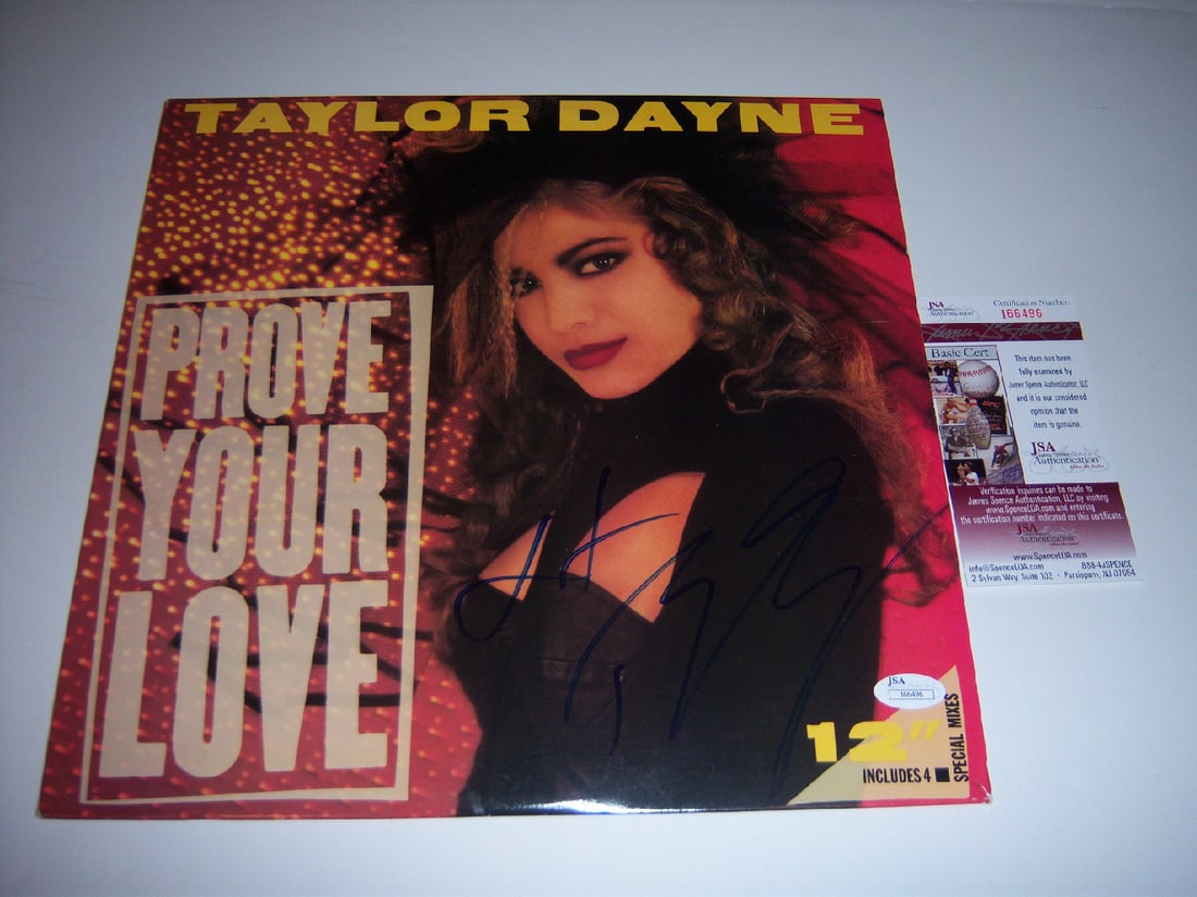 Original Taylor Dane Prove Your Love LP Signed Album with JSA COA: Original Taylor Dane Prove Your Love LP Signed Album with JSA COA This is an original LP record album of "Prove Your Love" signed by Taylor Dayne. The album includes a JSA Certificate of Authenticity 