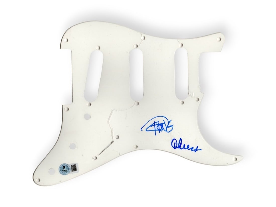 Electric Guitar Pickguard Signed by Cheech Marin and Tommy Chong Beckett Authenticated: Electric Guitar Pickguard Signed by Cheech Marin and Tommy Chong Beckett Authenticated This electric guitar pickguard has been autographed by Cheech Marin and Tommy Chong. The item is original and inc