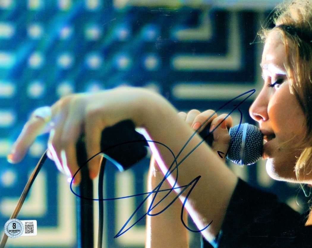 Lykke Li Autographed 8x10 Photo Certified by Beckett: Lykke Li Autographed 8x10 Photo Certified by Beckett This is a signed 8x10 photograph of Lykke Li, the renowned singer-songwriter. The autograph has been authenticated by Beckett Authentication Servic
