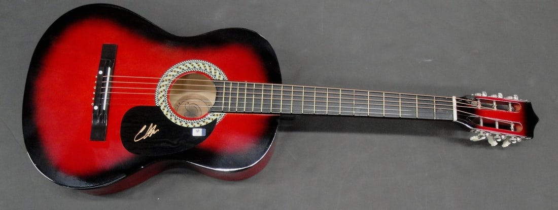 38 Inch Guitar Signed by Charlie Worsham with Global Authentics COA: 38 Inch Guitar Signed by Charlie Worsham with Global Authentics COA This 38-inch guitar is hand signed by Charlie Worsham, a country music star. The autograph is authenticated by Global Authentics (GA