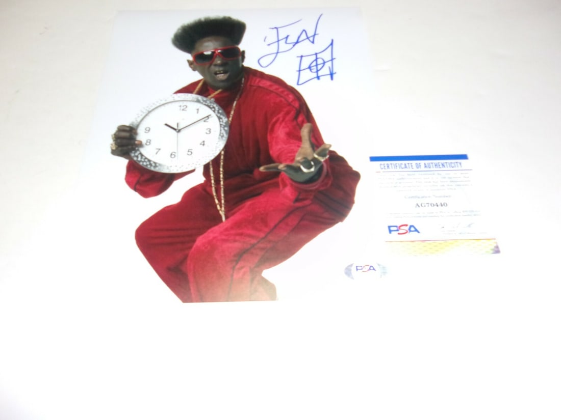 Flavor Flav Signed 8x10 Photo with PSA/DNA Authentication: Flavor Flav Signed 8x10 Photo with PSA/DNA Authentication This is an original 8x10 photograph signed by Flavor Flav, the rapper from Public Enemy. The photograph originates from the United States and 