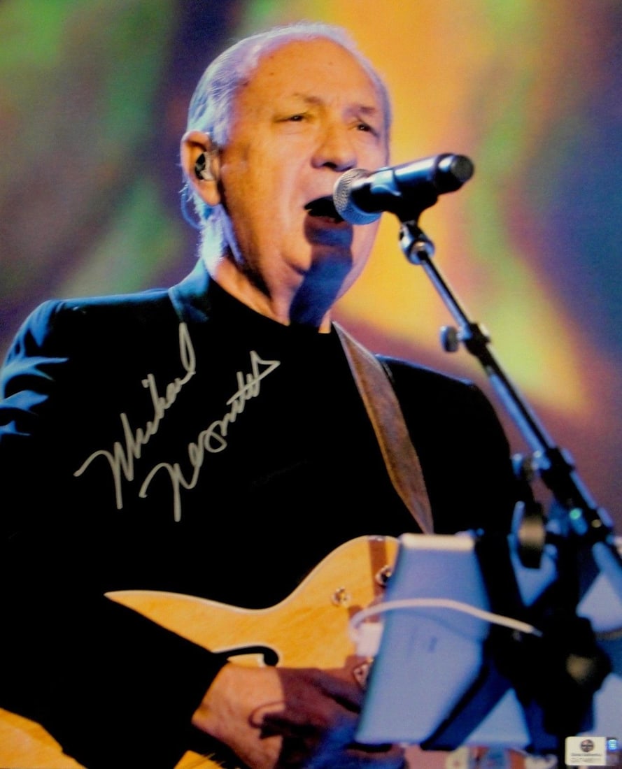 Michael Nesmith Autographed 11x14 Photo The Monkees JSA Authenticated: Michael Nesmith Autographed 11x14 Photo The Monkees JSA Authenticated This is an authentic, signed 11x14 photograph of Michael Nesmith from The Monkees, capturing the iconic musician in a moment of pe