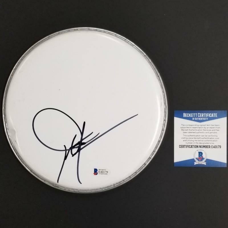 Drumhead Hand Signed by Country Artist Dwight Yoakam with Beckett COA: Drumhead Hand Signed by Country Artist Dwight Yoakam with Beckett COA This original drumhead is autographed by country music star Dwight Yoakam. It is an authentic collectible from the United States a