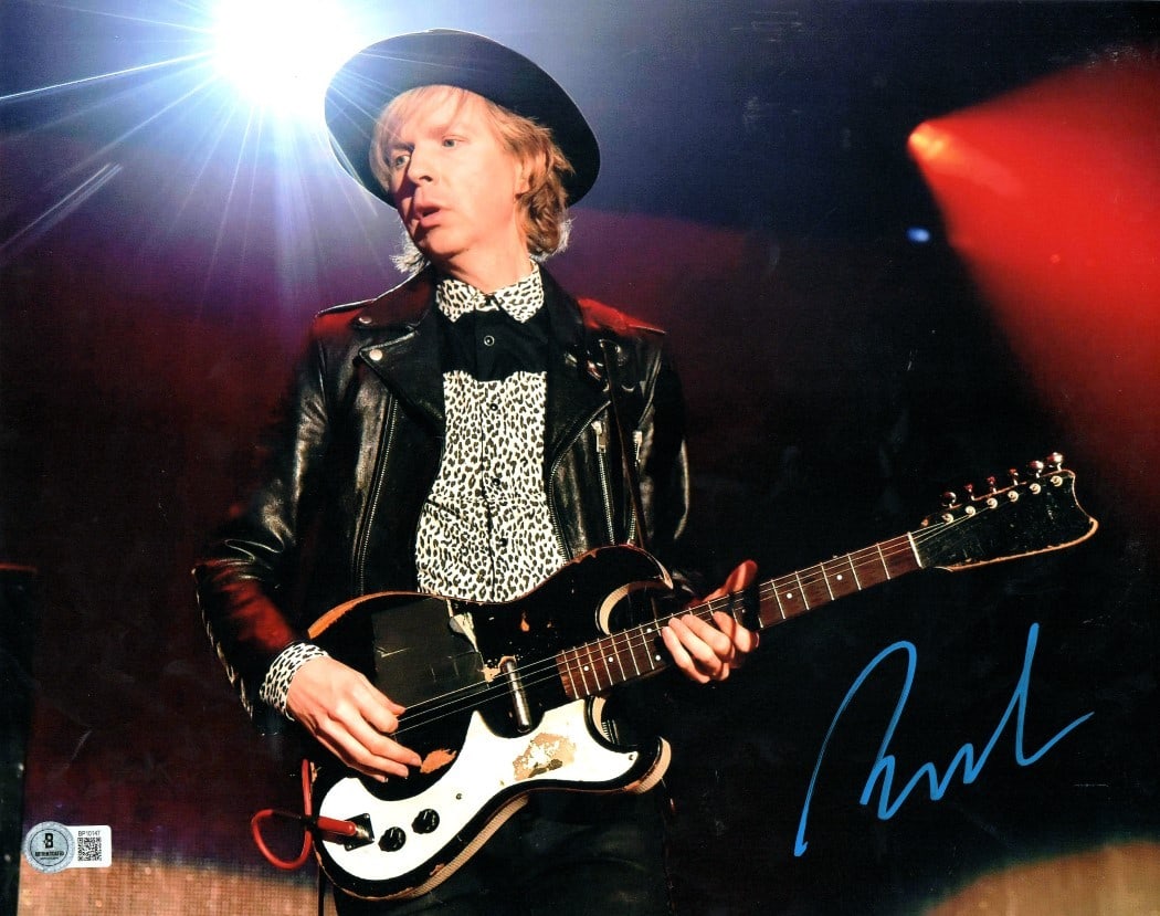 Beck Hansen Autographed 11x14 Photo Leather Jacket Guitar Beckett Authenticated: Beck Hansen Autographed 11x14 Photo Leather Jacket Guitar Beckett Authenticated This is an original 11x14 photograph of Beck Hansen, famously known for his musical talents, featuring him wearing a lea