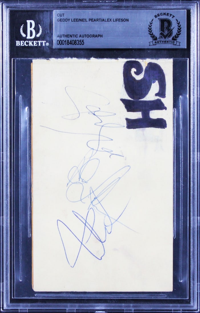 Rush Signed Cut Signature by Lee Peart Lifeson 3.25x5.25 BAS Slabbed: Rush Signed Cut Signature by Lee Peart Lifeson 3.25x5.25 BAS Slabbed This is an original cut signature measuring 3.25x5.25 inches, personally signed by the iconic members of Rush: Geddy Lee, Neil Pear