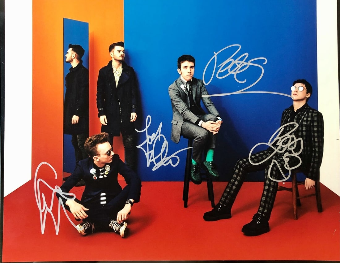 The Stripes Autographed 11x14 Photo Signed in NYC: The Stripes Autographed 11x14 Photo Signed in NYC This is an autographed 11x14 color photo of the group The Stripes, signed in silver sharpie. The signature was obtained in person in New York City, en