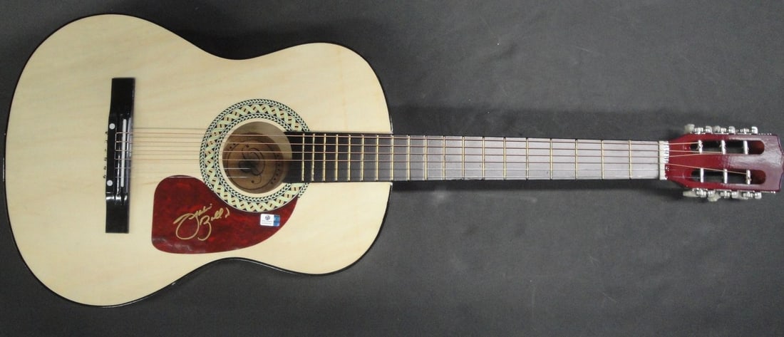 Acoustic Guitar Signed by Frankie Ballard with GAI Authentication: Acoustic Guitar Signed by Frankie Ballard with GAI Authentication This is an original 38-inch acoustic guitar that has been personally hand-signed by country star Frankie Ballard. The autograph is aut