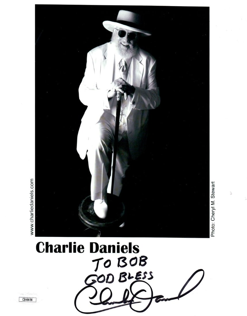 Charlie Daniels Signed 8X10 Photo To Bob God Bless JSA Authenticated: Charlie Daniels Signed 8X10 Photo To Bob God Bless JSA Authenticated This authentic 8x10 photograph features the signature of legendary musician Charlie Daniels, personalized with the message "To Bob 