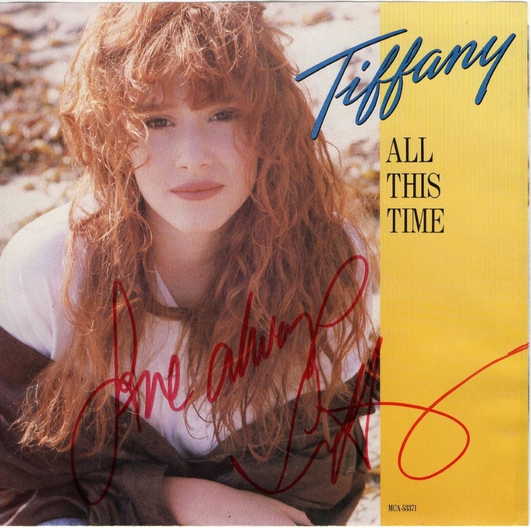 Tiffany Autographed 45 Record Sleeve All This Time JSA Certified: Tiffany Autographed 45 Record Sleeve All This Time JSA Certified This is an authentic autographed 45 record sleeve by Tiffany, featuring the title "All This Time." The signature has been authenticated