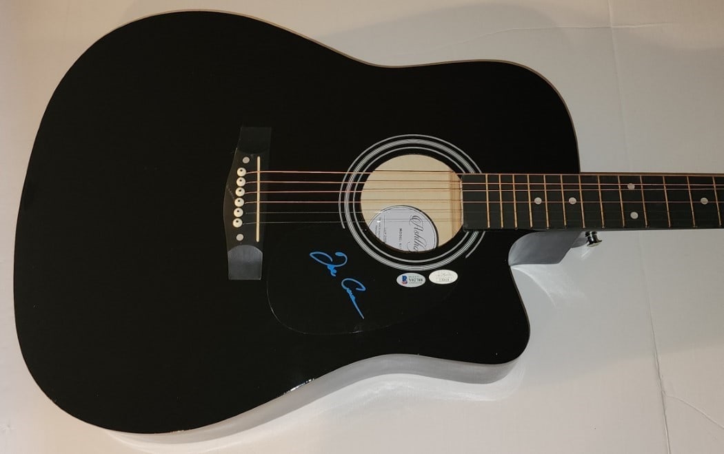 Joe Cocker Signed Acoustic Guitar The Grease Band JSA Beckett Authenticated: Joe Cocker Signed Acoustic Guitar The Grease Band JSA Beckett Authenticated This is an authentic Joe Cocker signed acoustic guitar, featuring the iconic Up Where We Belong song associated with The Gre
