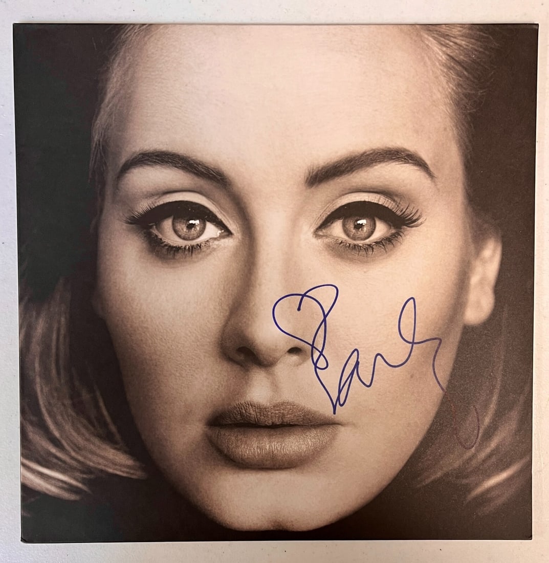 Adele Autographed Vinyl Album 25 Rare 2015 Original: Adele Autographed Vinyl Album 25 Rare 2015 Original This is a rare autographed vinyl album of Adele's hit record "25". The album, originally released in 2015, features a genuine signature from the pop