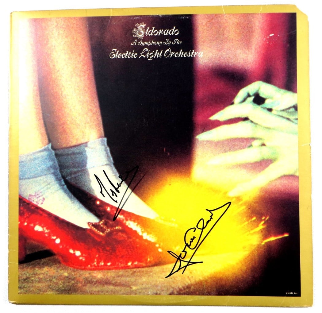 Louis Clark Mik Kaminski Signed ELO Eldorado Album Cover Beckett Authenticated: Louis Clark Mik Kaminski Signed ELO Eldorado Album Cover Beckett Authenticated This is an original autographed record album cover featuring the signatures of Louis Clark and Mik Kaminski from the Elec