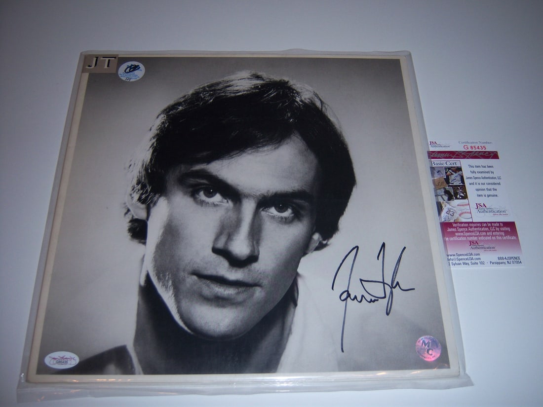 James Taylor Autographed JT Album with JSA Certification: James Taylor Autographed JT Album with JSA Certification This is an original "JT" LP record album by James Taylor, featuring his authentic signature. The album originates from the United States and is