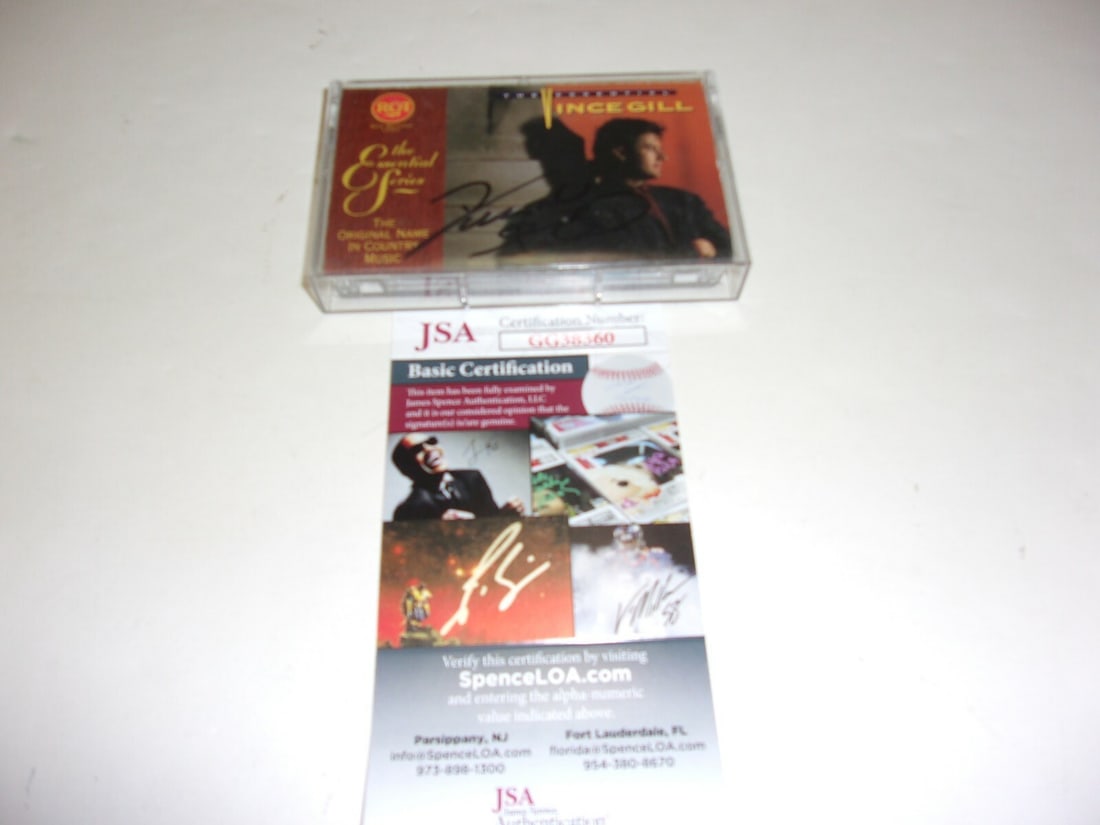 Signed Vince Gill Cassette Album The Essential Singer With JSA COA: Signed Vince Gill Cassette Album The Essential Singer With JSA COA This is an original cassette tape album of Vince Gill's "The Essential," featuring an autograph. The item comes from the United State