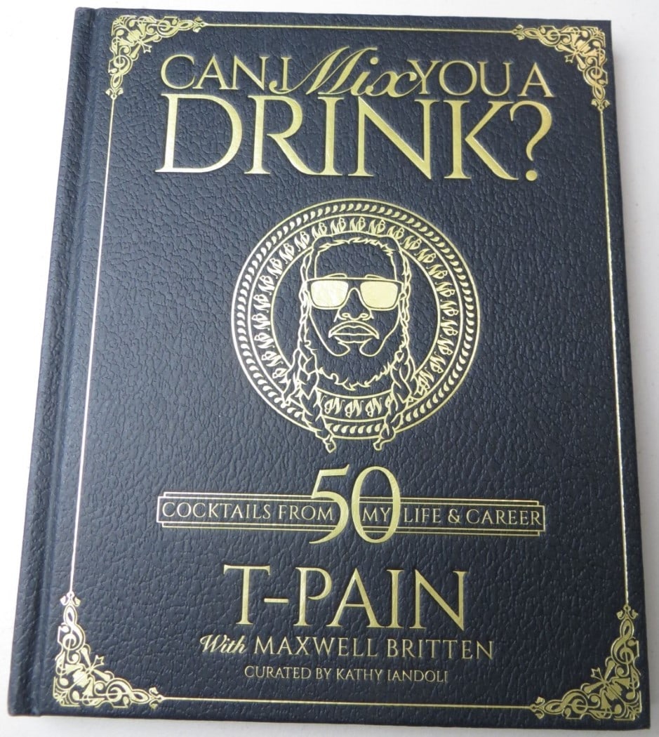 Signed Can I Mix You a Drink Hardcover Book JSA Authenticated by T-Pain: Signed Can I Mix You a Drink Hardcover Book JSA Authenticated by T-Pain This is a pre-owned hardcover book titled "Can I Mix You a Drink?" signed by T-Pain. The autograph has been authenticated by Jam