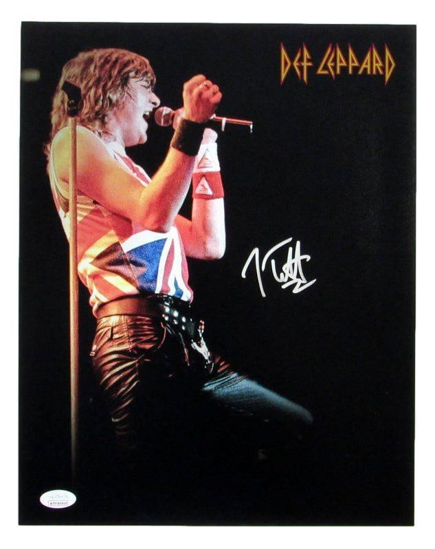 Joe Elliott Autographed 11x14 Def Leppard Photo JSA Certified: Joe Elliott Autographed 11x14 Def Leppard Photo JSA Certified This 11x14 photo featuring Joe Elliott of Def Leppard is a must-have for any rock music enthusiast. Authentically signed by the artist, th