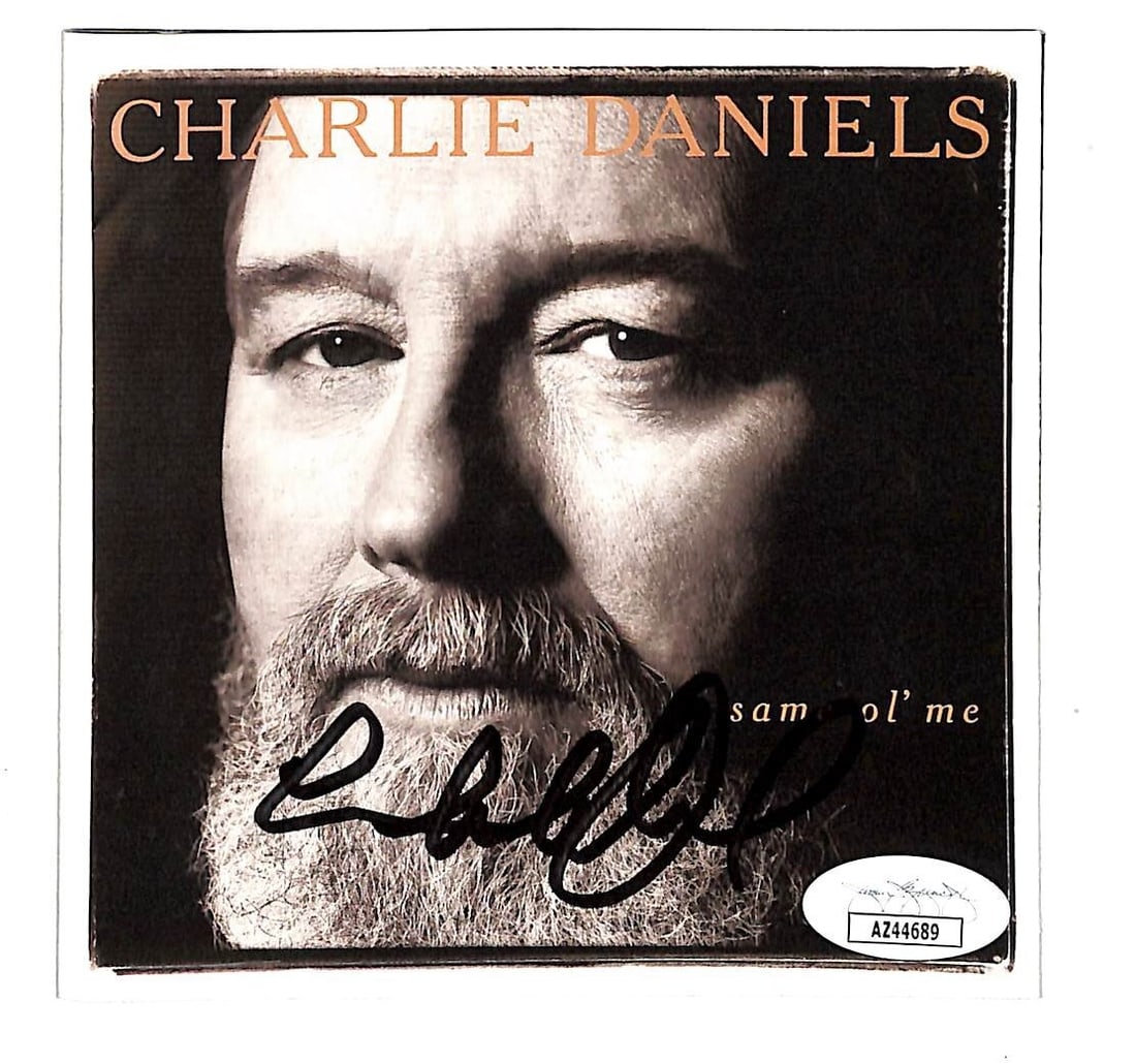 Charlie Daniels Signed CD Cover with JSA Authentication: Charlie Daniels Signed CD Cover with JSA Authentication This is an original autographed CD cover by country music legend Charlie Daniels. The signed cover comes with authentication from James Spence A
